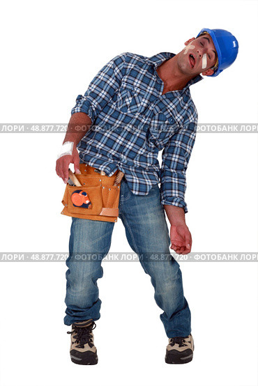 Tradesman suffering. Стоковое фото, агентство Ingram Publishing / Фотобанк Лори