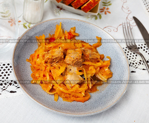 Traditional Polish Bigos from braised sauerkraut with pork ribs. Стоковое фото, фотограф Яков Филимонов / Фотобанк Лори