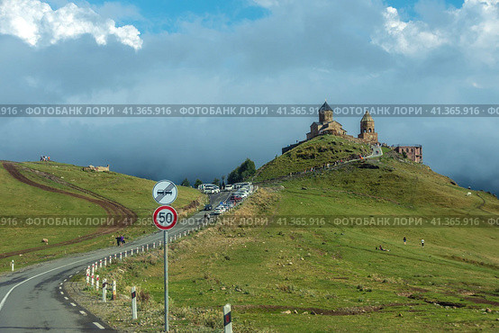 Trinity Church in Gergeti near Mount Kazbegi. Stepantsminda. Georgia. 06.09.2023. Редакционное фото, фотограф Ярославский Максим / Фотобанк Лори