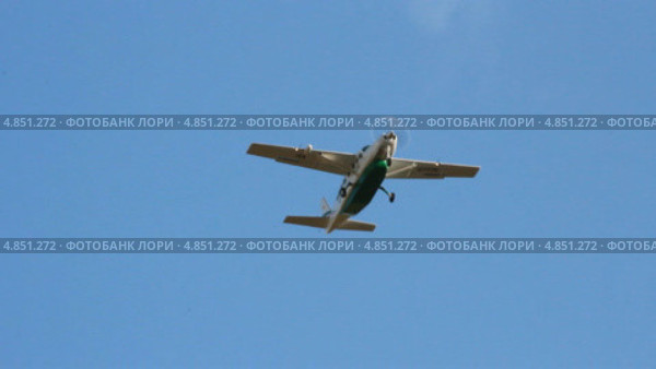 Цессна-208, бортовой RA-67178, взлетает в аэропорту Уфа (2013 год). Редакционное видео, видеограф Mikhail Erguine / Фотобанк Лори
