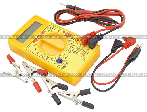 Цифровой мультиметр и радиоэлементы на белом фоне. Digital  multimeter on a white background. Стоковое фото, фотограф Татьяна Д / Фотобанк Лори
