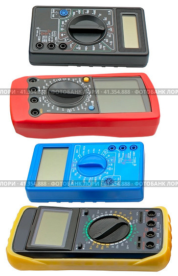 Цифровые мультиметры разного типа на белом фоне. Digital  multimeters on a white. Стоковое фото, фотограф Татьяна Д / Фотобанк Лори