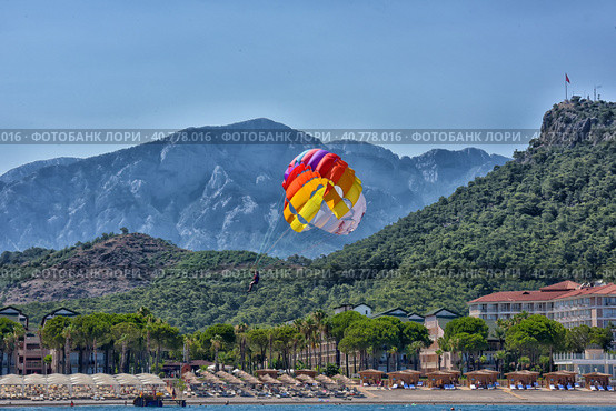 Turkey, Kemer 17,07,2015 Parasailing near the sea. Редакционное фото, фотограф Анна Кривицкая / Фотобанк Лори