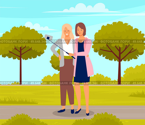 Two girlfriends take selfie on phone while walking in park. Friendship, photo in garden. Friends take pictures during meeting outdoor on weekend. Women use smartphone to record post for social network. Two girlfriends take selfie on phone while walking in sity park. Friendship, photo in garden. Стоковая иллюстрация, агентство Ingram Publishing / Фотобанк Лори