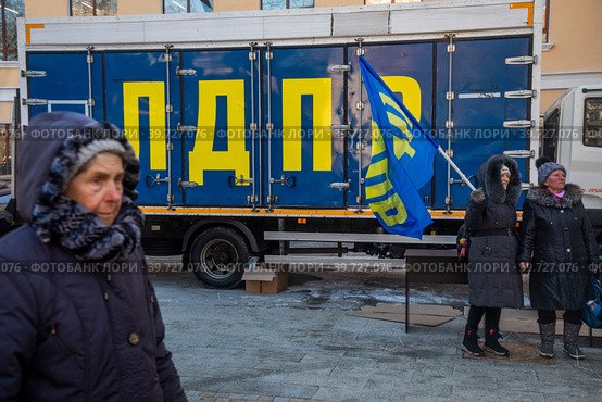 Участники митинга партии ЛДПР приуроченного к празднованию Дня защитника Отечества в городе Москве, Россия (2023 год). Редакционное фото, фотограф Николай Винокуров / Фотобанк Лори