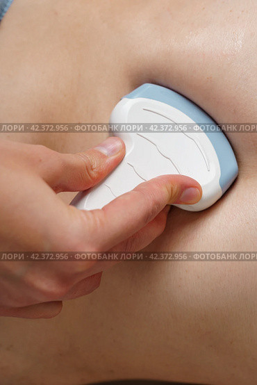 Ultrasound diagnostics of gallbladder, pancreas, right lobe of liver, bile ducts, abdominal cavity. Стоковое фото, фотограф Natalia Gdovskaia / Фотобанк Лори