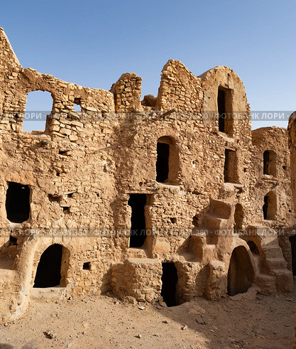 Uninhabited fortified village with houses and granaries, Tunisia. Ksar of Mgabla, Berber, Tataouine. Стоковое фото, фотограф Яков Филимонов / Фотобанк Лори