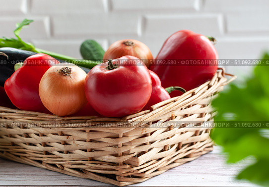 Various vegetables in a wicker basket. Food. Tomatoes, onions, peppers, cucumbers. Стоковое фото, фотограф Анастасия  Гудантова / Фотобанк Лори