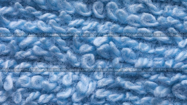 Video of blue terry towel. Boucled textile background from loops of natural cotton threads. Basis for sewing home textiles, terry sheets, bathrobes and home clothes. Flat lay, close-up, macro, mockup. Стоковое видео, видеограф Виктория Катьянова / Фотобанк Лори
