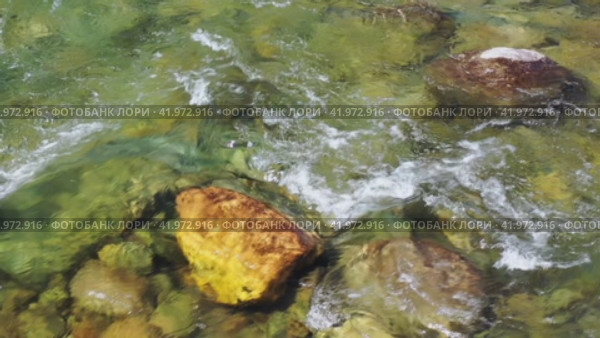 \video of water and stones ofAltai river Bashkaus. Camera looks down. Стоковое видео, видеограф Сергей Пристяжнюк (Serg Zastavkin) / Фотобанк Лори
