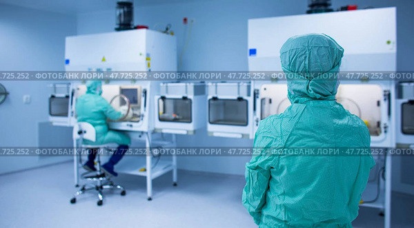 Virus antidote being prepared in a biochem lab with extremely strict precautionary measures (shallow DOF  color toned image) Стоковое фото, фотограф Viktor Cap / PantherMedia / Фотобанк Лори