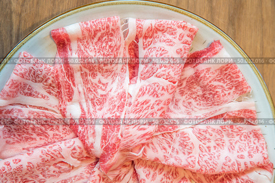Wagyu A5 Beef meat texture for food background. Стоковое фото, агентство Ingram Publishing / Фотобанк Лори
