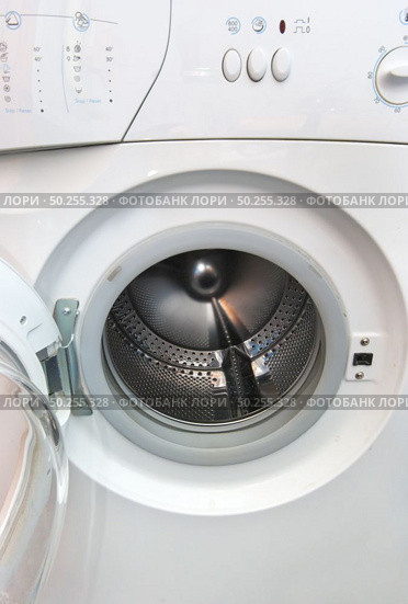Washing machine closeup. Element of design. Стоковое фото, агентство Ingram Publishing / Фотобанк Лори