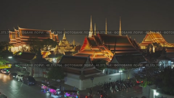 Wat Pho temple in Bangkok at night, Thailand. Стоковое видео, видеограф Михаил Коханчиков / Фотобанк Лори