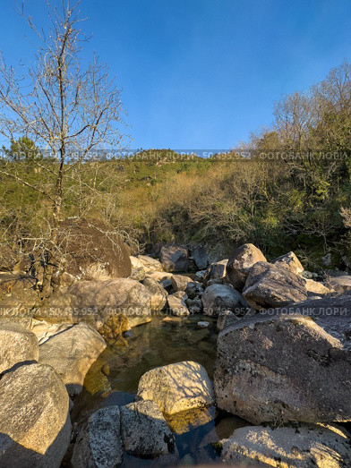 Water stream near Fecha de Barjas waterfall (also known as Tahiti waterfall) in the mountains of Peneda-Geres National Park, Portugal. Стоковое фото, агентство Ingram Publishing / Фотобанк Лори
