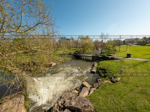 Waterfall on the Caster River in the City Park of Ovar. Стоковое фото, агентство Ingram Publishing / Фотобанк Лори