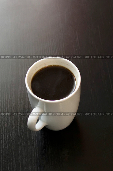 White cup of coffee on wooden table. Стоковое фото, фотограф Аксенова Вера / Фотобанк Лори