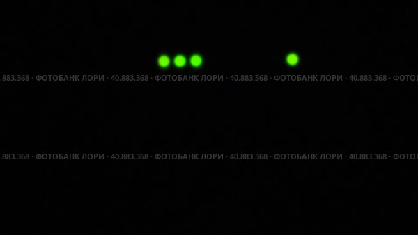 Wi-Fi router or modem light blinking. Wireless internet connection. Flashing green warning lights in black darkness. The process of transferring information through modern means of communication. Стоковое видео, видеограф Юлия Петровская / Фотобанк Лори