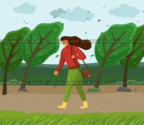Windy weather, woman walking in park through strong wind, green trees bend, leaves flying in air, young girl with brown long hair, red warm sweater, green striped pants, bag on shoulder, boots. Windy weather, woman walking in park through strong wind, green trees bend, leaves flying in air. Стоковая иллюстрация, агентство Ingram Publishing / Фотобанк Лори