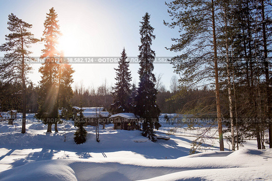 Winter landscape of Ruskeala Park. Ruskeala waterfalls under snow at sunset and suspension bridges. Beautiful winter landscape. Russia, Republic of Karelia. (2018 год). Стоковое фото, фотограф Photojuli / Фотобанк Лори