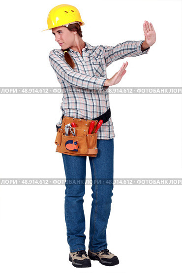 Woman doing sign to stop. Стоковое фото, агентство Ingram Publishing / Фотобанк Лори