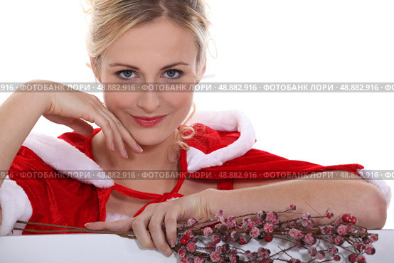 Woman dressed to celebrate Christmas. Стоковое фото, агентство Ingram Publishing / Фотобанк Лори