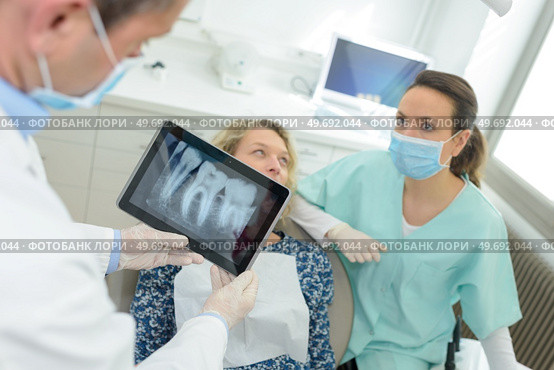 woman patient at dental surgery. Стоковое фото, агентство Ingram Publishing / Фотобанк Лори