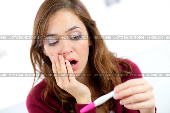 Woman shocked to find out she’s pregnant. Стоковое фото, агентство Ingram Publishing / Фотобанк Лори