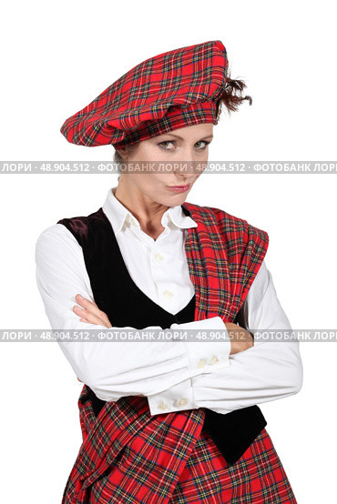 Woman wearing Scottish clothes. Стоковое фото, агентство Ingram Publishing / Фотобанк Лори