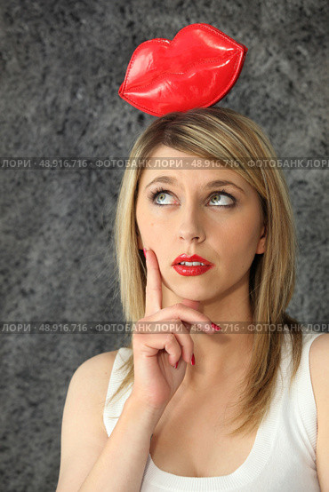 Woman with romance on her mind. Стоковое фото, агентство Ingram Publishing / Фотобанк Лори