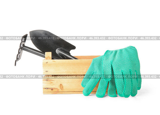 Wooden box with different gardening tools on white background. Стоковое фото, фотограф Pixel_shot / Фотобанк Лори