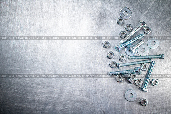 Working tool. Nuts and bolts on the table. Стоковое фото, фотограф Артем Шадрин / Фотобанк Лори