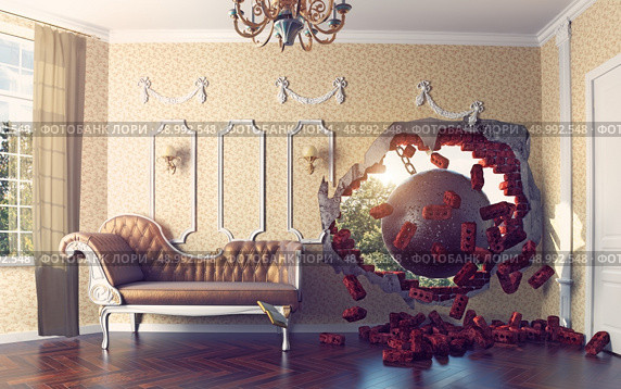 wrecking ball enters the room. 3d creative concept. Стоковое фото, агентство Ingram Publishing / Фотобанк Лори