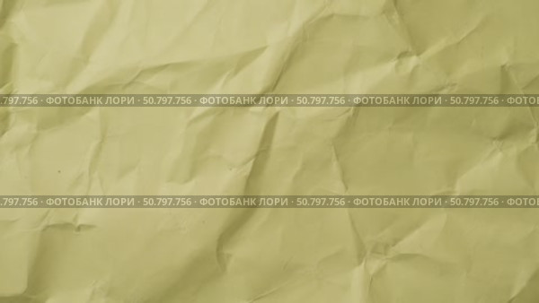 Wrinkled yellow paper animation. Crumpled texture in stop motion style. Ideal grunge background or textured cover loop. Стоковое видео, видеограф Mihail Mihaylov / Фотобанк Лори
