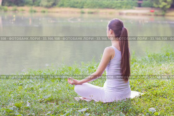 Yoga Woman Meditating Relaxing Healthy Lifestyle. Стоковое фото, фотограф Mitar gavric / PantherMedia / Фотобанк Лори