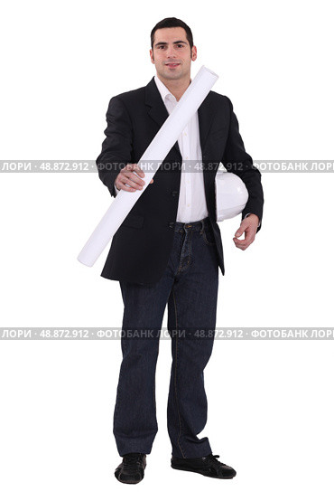 Young architect with plans in hand. Стоковое фото, агентство Ingram Publishing / Фотобанк Лори
