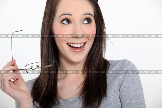 Young brunette smiling. Стоковое фото, агентство Ingram Publishing / Фотобанк Лори