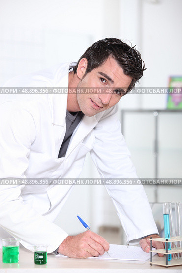 young man drafting a report. Стоковое фото, агентство Ingram Publishing / Фотобанк Лори