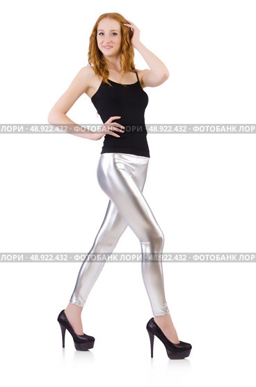 Young redhead girl in tight leggings. Стоковое фото, агентство Ingram Publishing / Фотобанк Лори