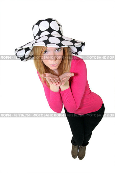 Young woman blowing you a kiss. Стоковое фото, агентство Ingram Publishing / Фотобанк Лори