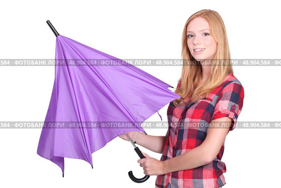 Young woman opening a purple umbrella. Стоковое фото, агентство Ingram Publishing / Фотобанк Лори
