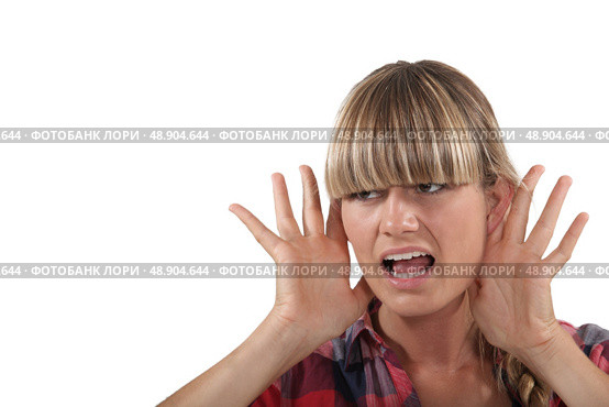 Young woman struggling to hear. Стоковое фото, агентство Ingram Publishing / Фотобанк Лори