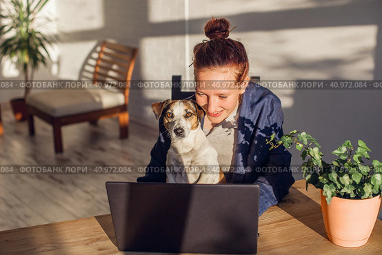 Young woman studying online on laptop at home. Стоковое фото, фотограф Гладских Татьяна / Фотобанк Лори