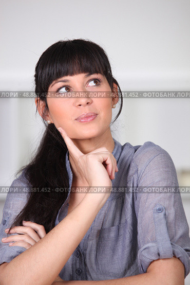 young woman wondering. Стоковое фото, агентство Ingram Publishing / Фотобанк Лори