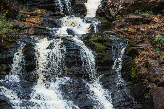 Yukankoski Waterfall (White Bridges) in the Republic of Karelia on a summer evening, Russia. Стоковое фото, фотограф Photojuli / Фотобанк Лори