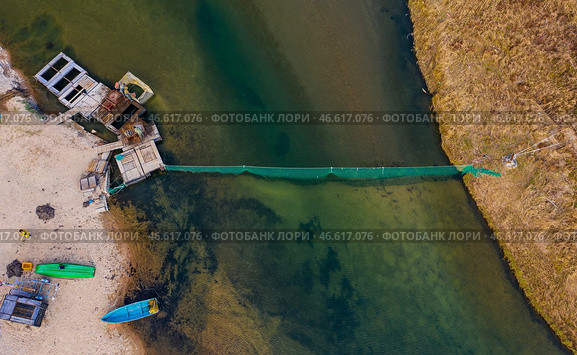 Заградительный невод в устье реки. Стоковое фото, фотограф Юрий Смитюк / ТАСС / Фотобанк Лори