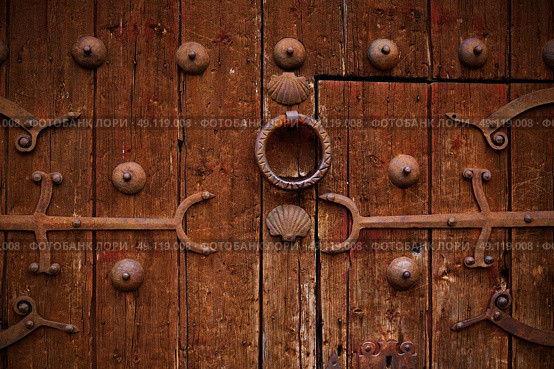 Zamora detail of old aged wood door in Spain by the via de la Plata way. Стоковое фото, агентство Ingram Publishing / Фотобанк Лори