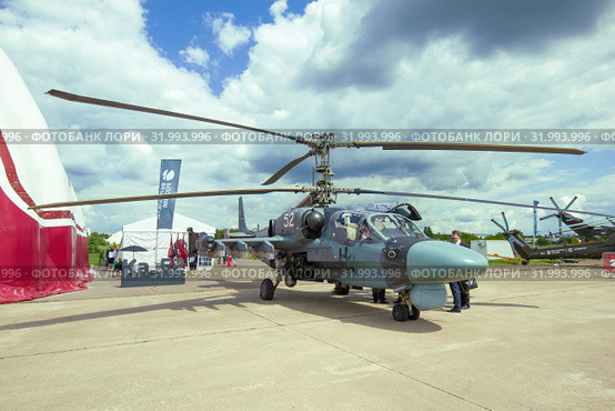 ZHUKOVSKY, RUSSIA - JULY 20, 2017: Russian reconnaissance and attack helicopter Ka-52 on the MAKS-2017 air show. Редакционное фото, фотограф Виктор Карасев / Фотобанк Лори
